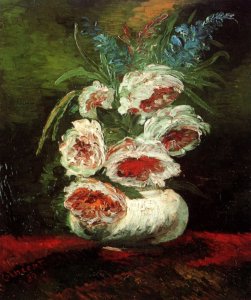 Vase With Red And White Carnations On Yellow Background
