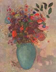Flowers In A Vase With Blue Decoration
